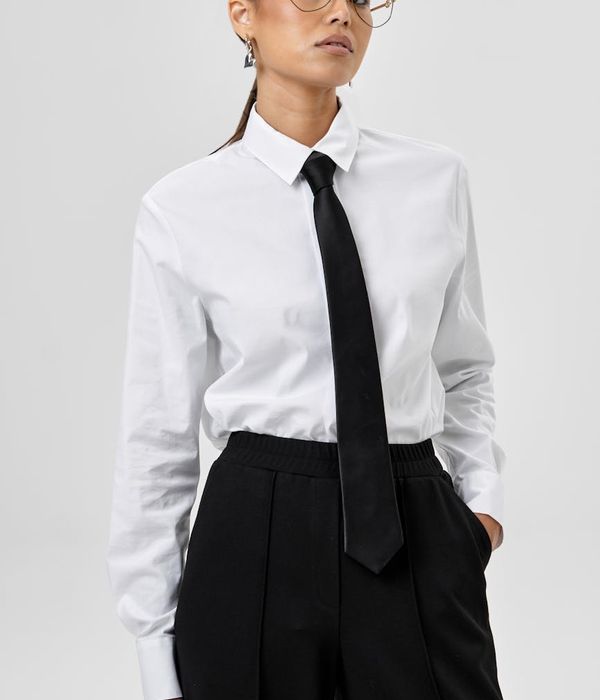 Confident female executive in professional business attire